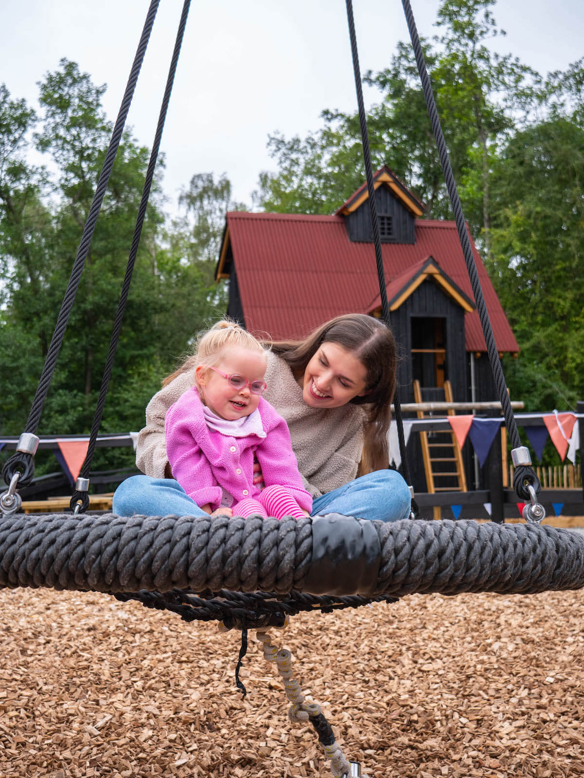 Swinging and playing together at The Madeley Wood Company adventure play at Blists Hill Museum by CAP.Co