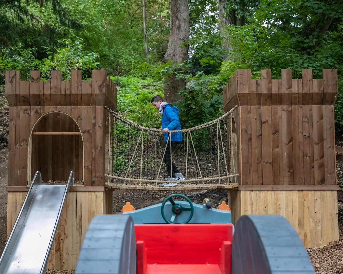 The view from the cockpit of the Renault VI to the toddler wobbly bridge at Belvoir Castle Adventure Play by CAP.Co