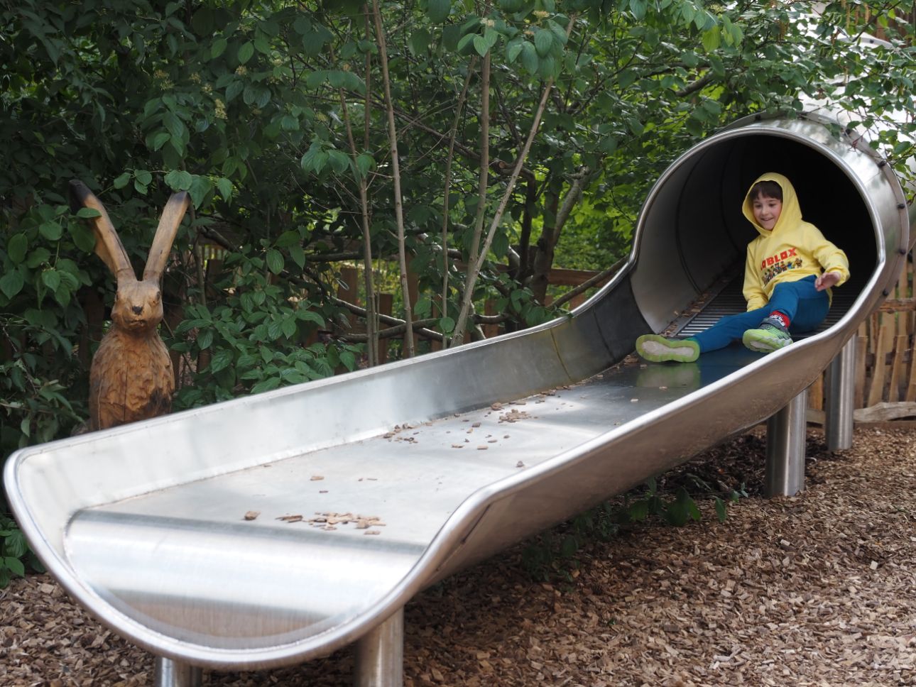 A Hare looks on at the bottom of the roller slide