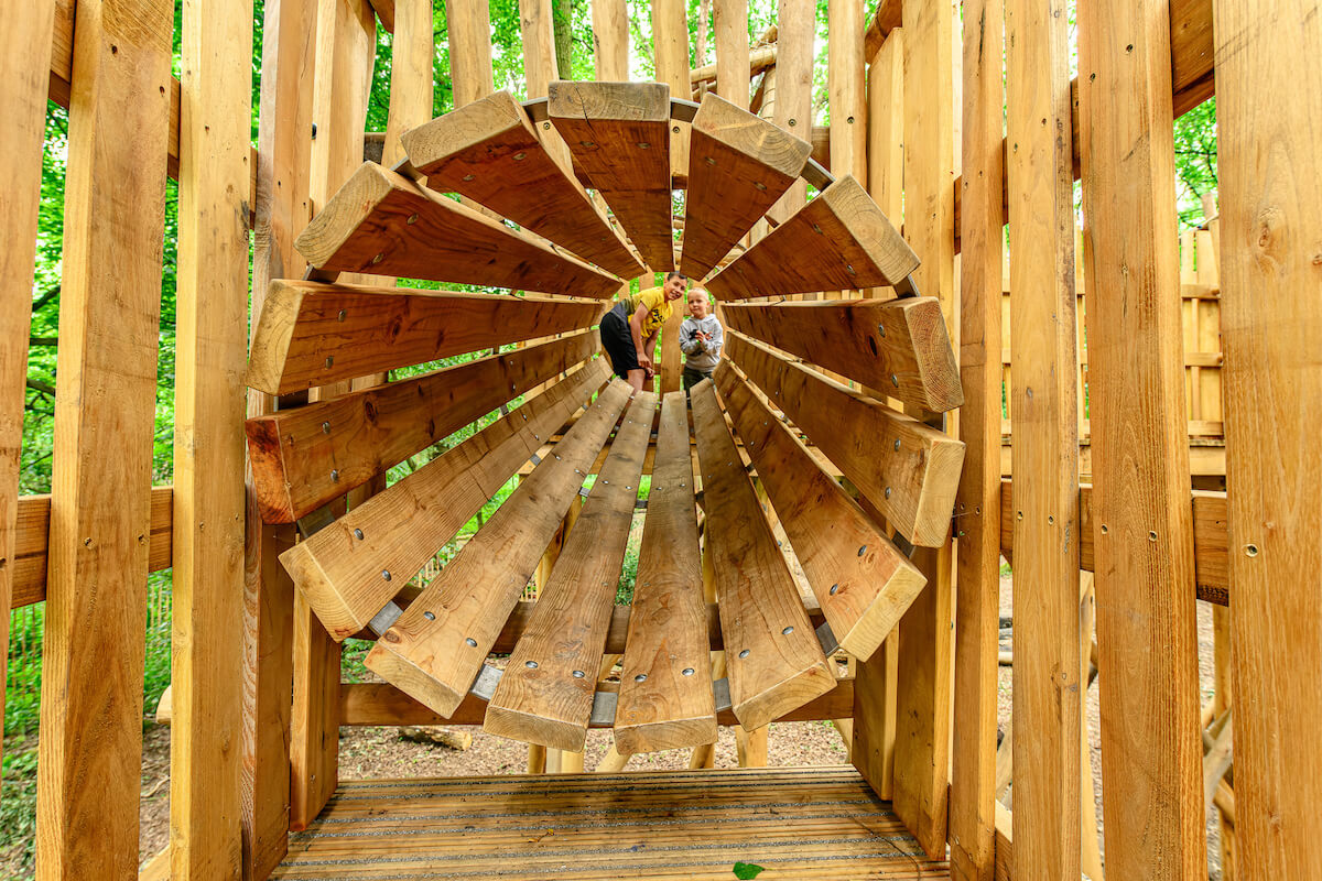 One of the crawl tunnels to get to the big slide at Hermits Hollow at Coombe Country Park with Adventure play by CAP.Co