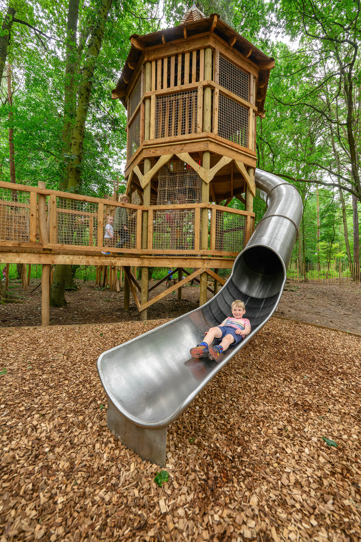 Whizzing down the slide at Hermits Hollow at Coombe Country Park with Adventure play by CAP.Co