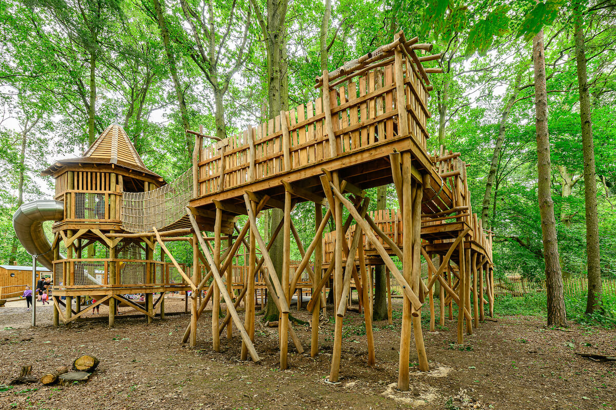 Rear view of Hermits Hollow at Coombe Country Park with Adventure play by CAP.Co