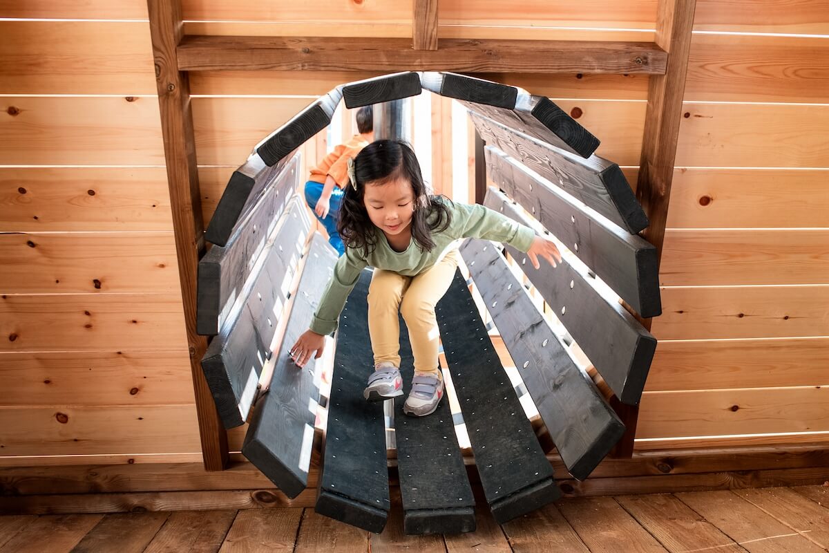Crawl tunnel at The Cove at the National Maritime Museum Inclusive play by CAP.Co