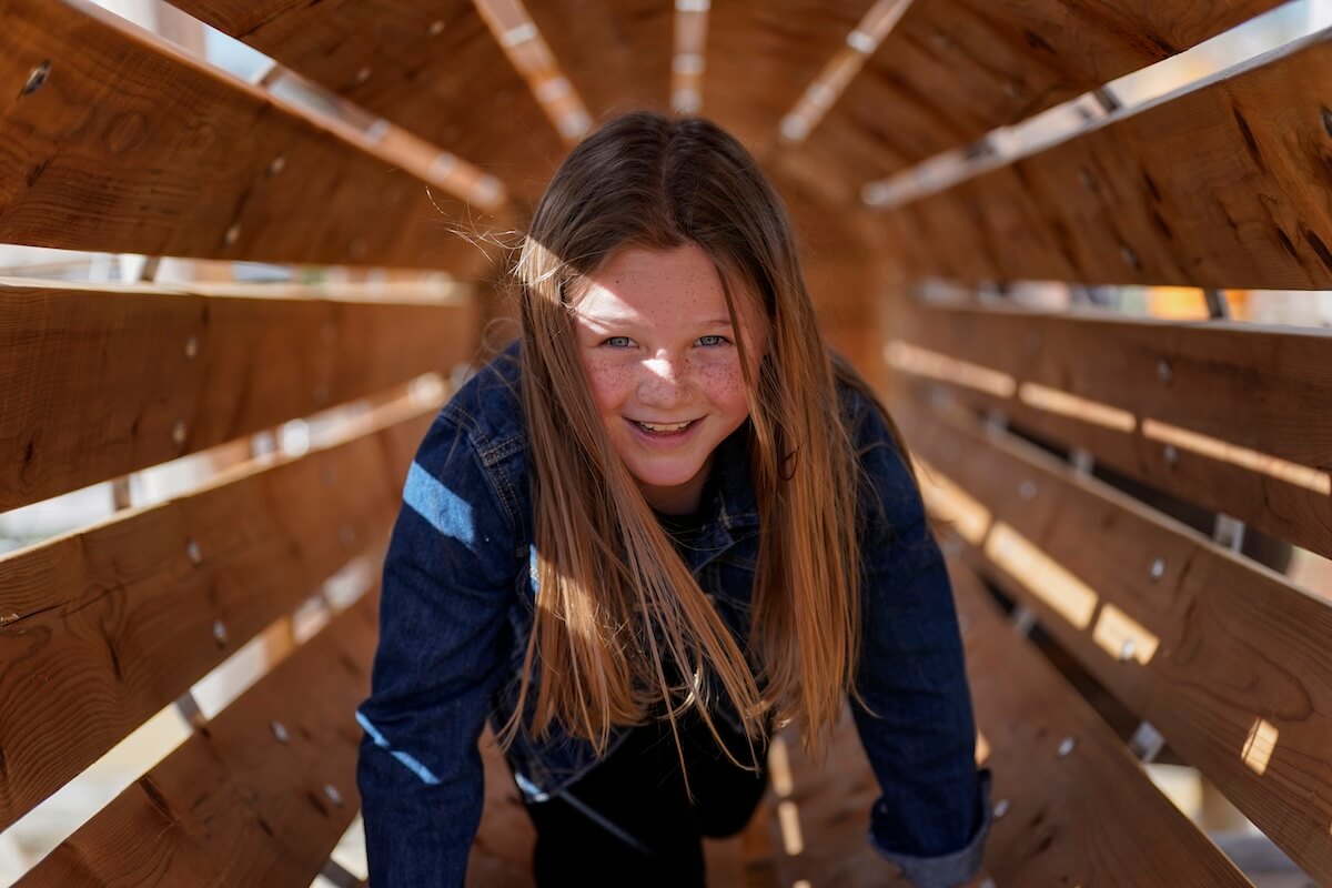 Crawl tunnel in the sun at The Lost Garden within Blenheim Palace Adventure Play by CAP.Co