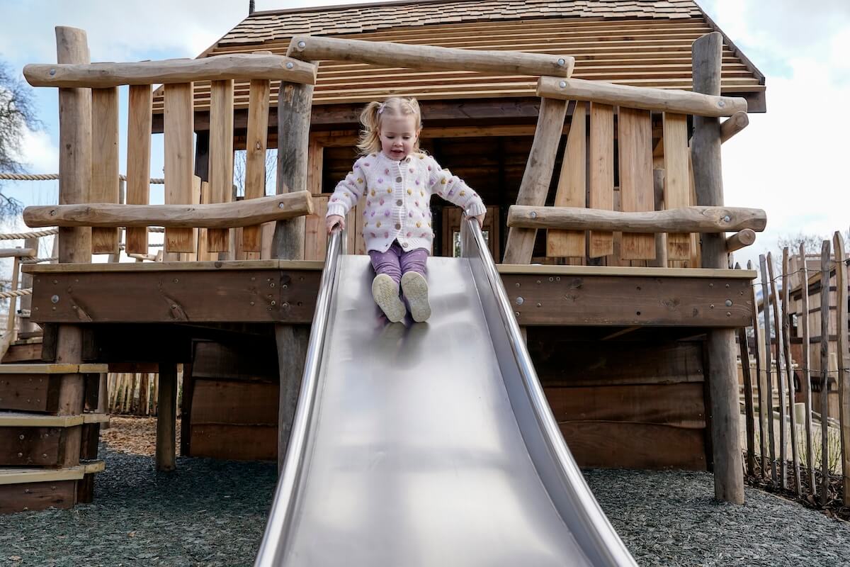 Enjoy the smaller slide at The Lost Garden within Blenheim Palace Adventure Play by CAP.Co
