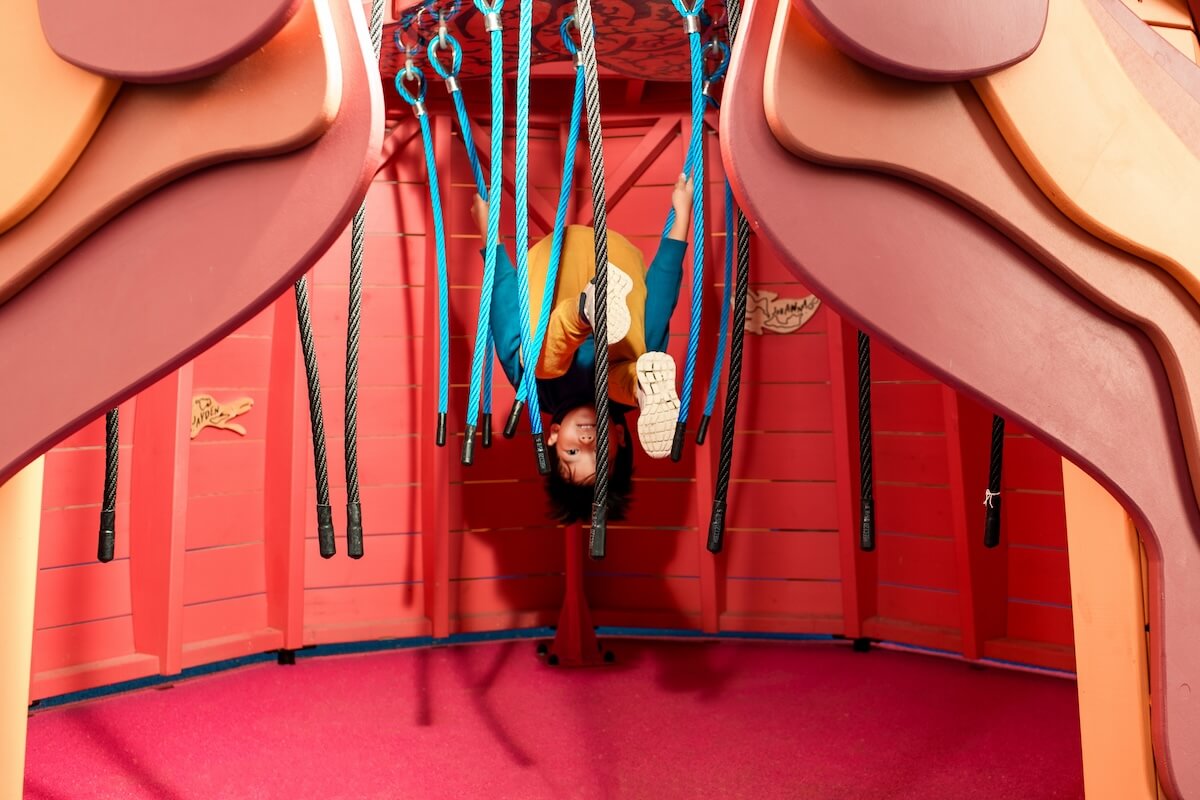 Hanging upside down at The Cove at the National Maritime Museum Inclusive play by CAP.Co