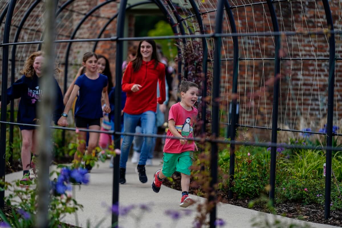 Kids cannot wait to enter The Lost Garden within Blenheim Palace Adventure Play by CAP.Co
