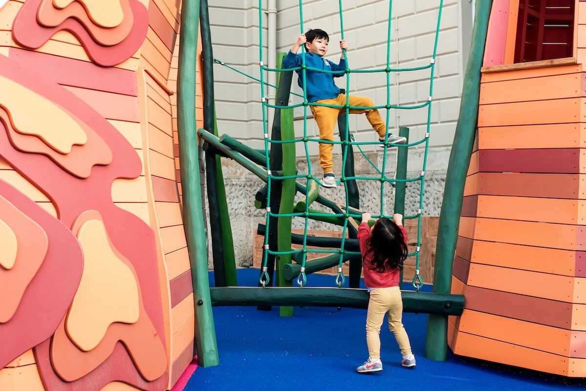 There's a climbing net inside the The Cove at the National Maritime Museum Inclusive play by CAP.Co