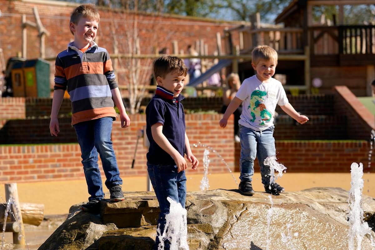 Three boys together at The Lost Garden within Blenheim Palace Adventure Play by CAP.Co