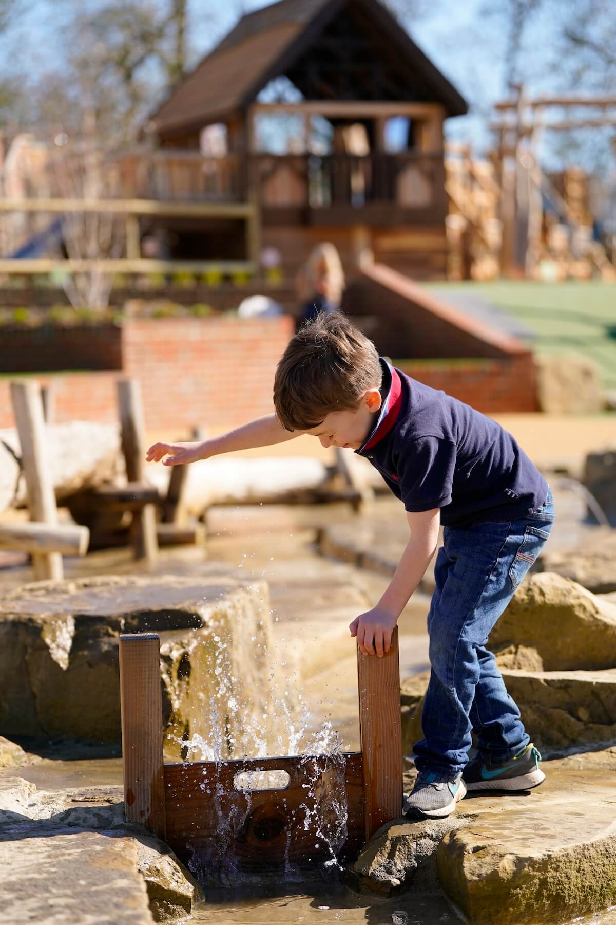 redirecting the water flow at The Lost Garden within Blenheim Palace Adventure Play by CAP.Co
