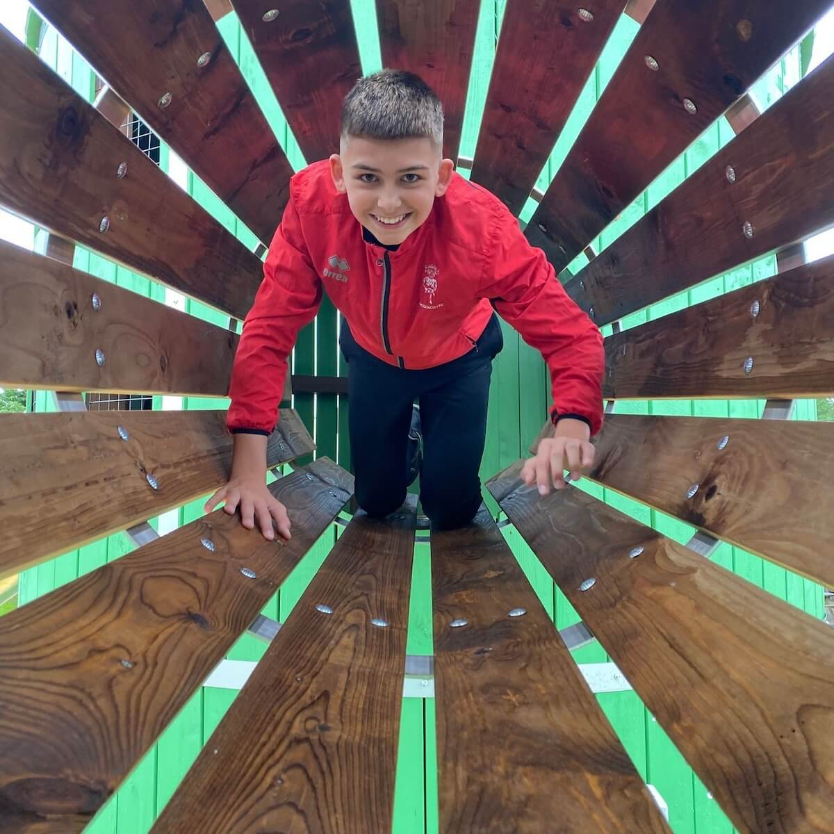 Clambering between silos at silo play at Rand Farm park by CAP.Co