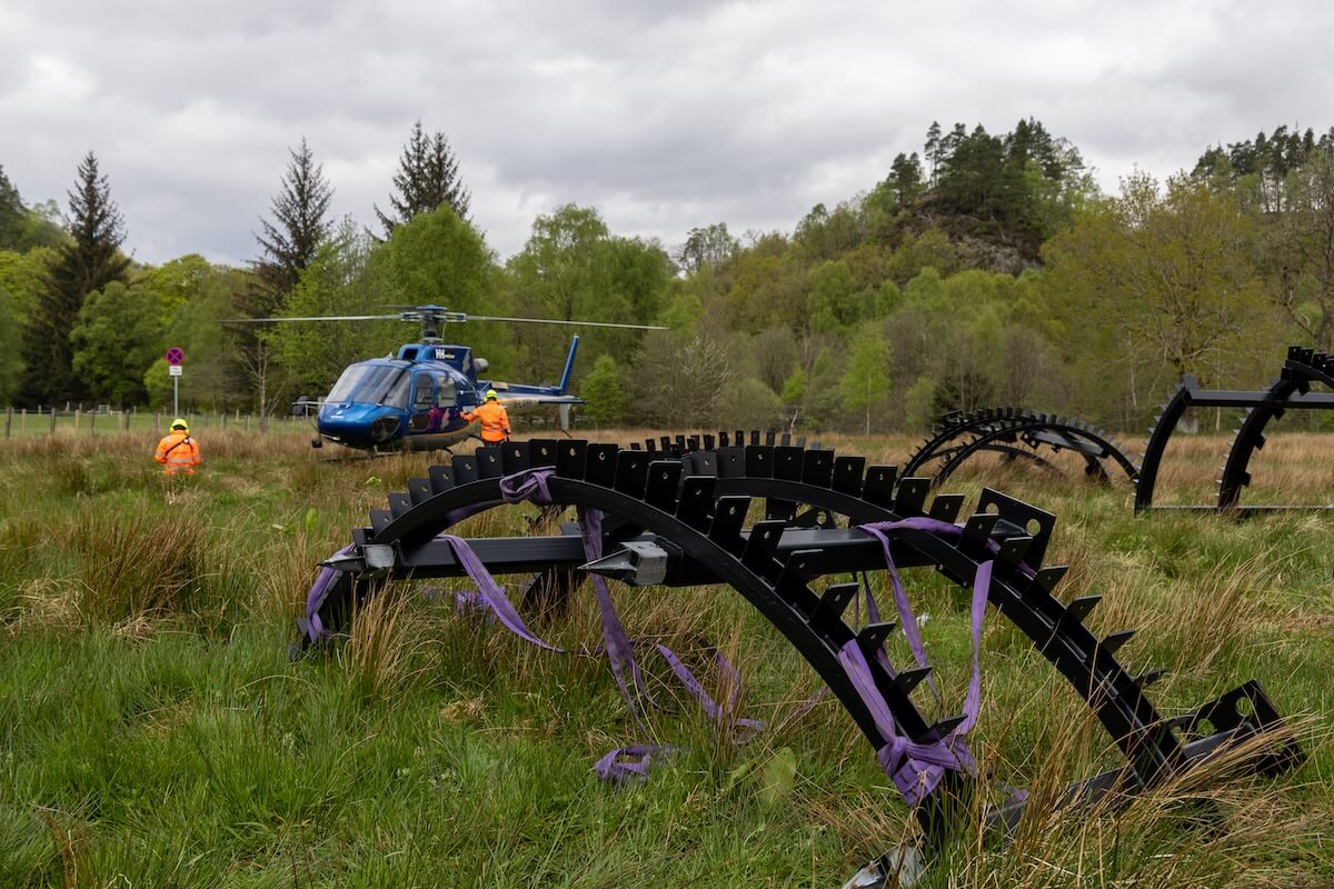 Product and helicopter together for the Roderick Dhu lookout tower