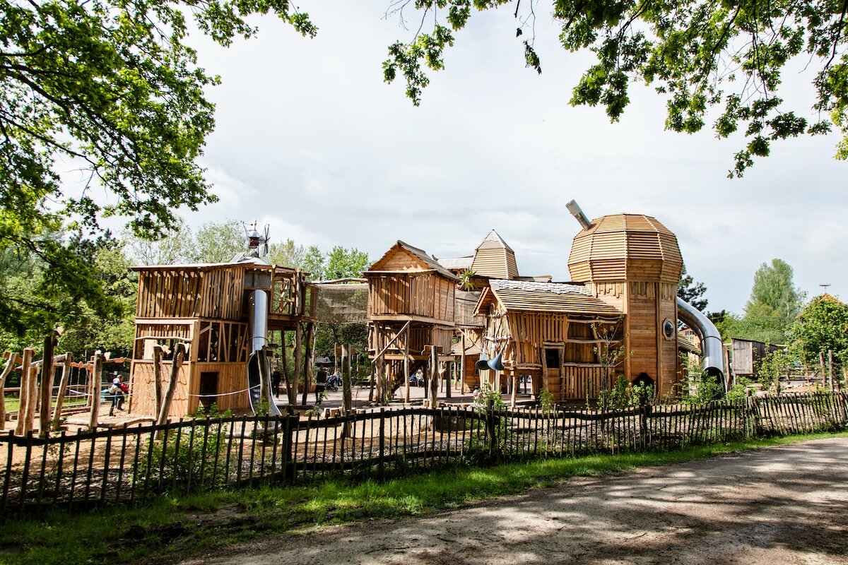 Distant view of Neos Homestead at Parc Sainte Croix with adventure play by CAP.CO Photography by Kev Foster
