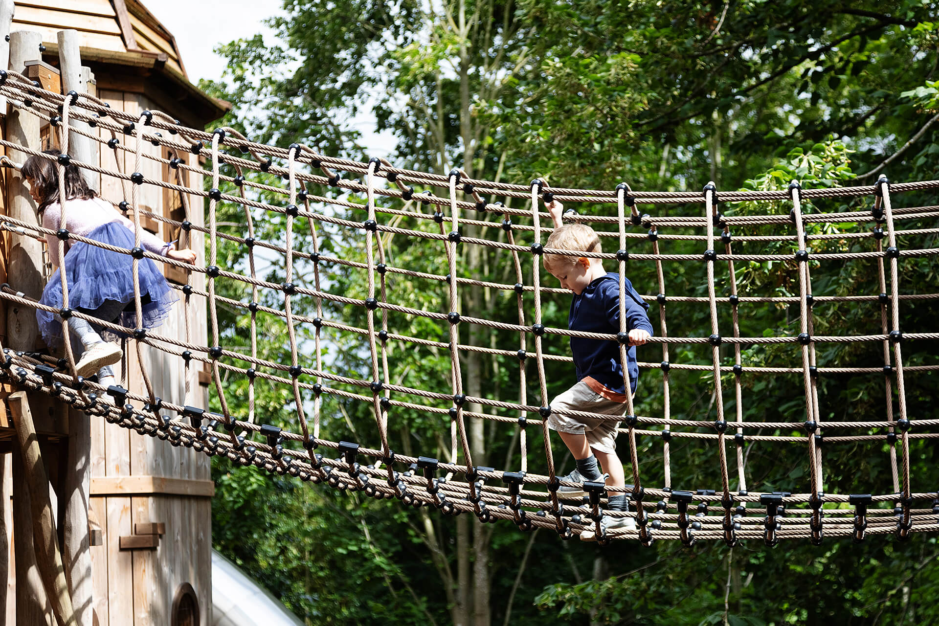 These climbs are easy for kids and killers for adults at Hide and Secrets adventure play at Burghley House by CAP.CO with photography by Kev Foster