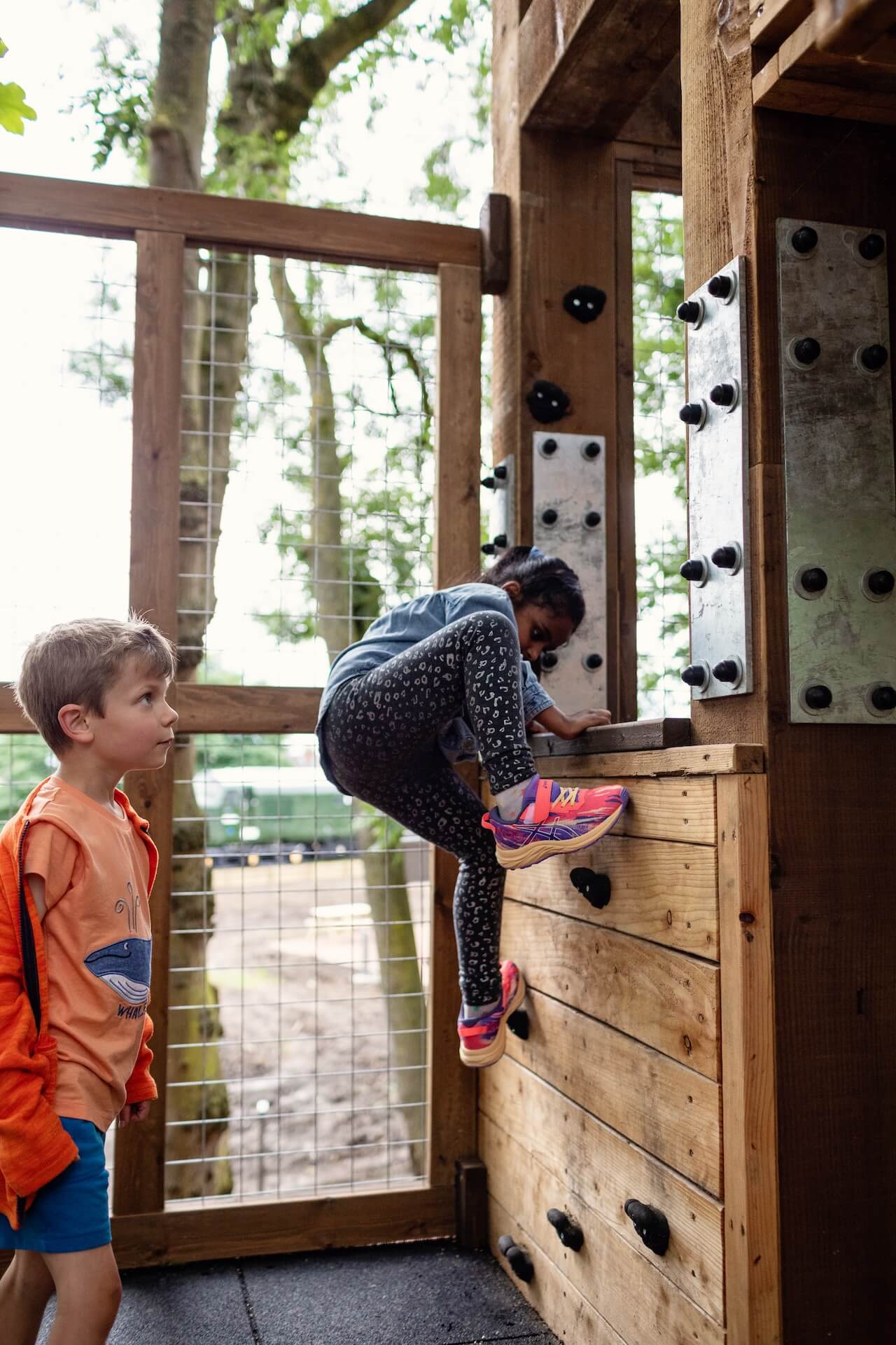 Climbing into the play at Hopetown Darlington adventure play by CAP.CO with photography by Kev Foster.