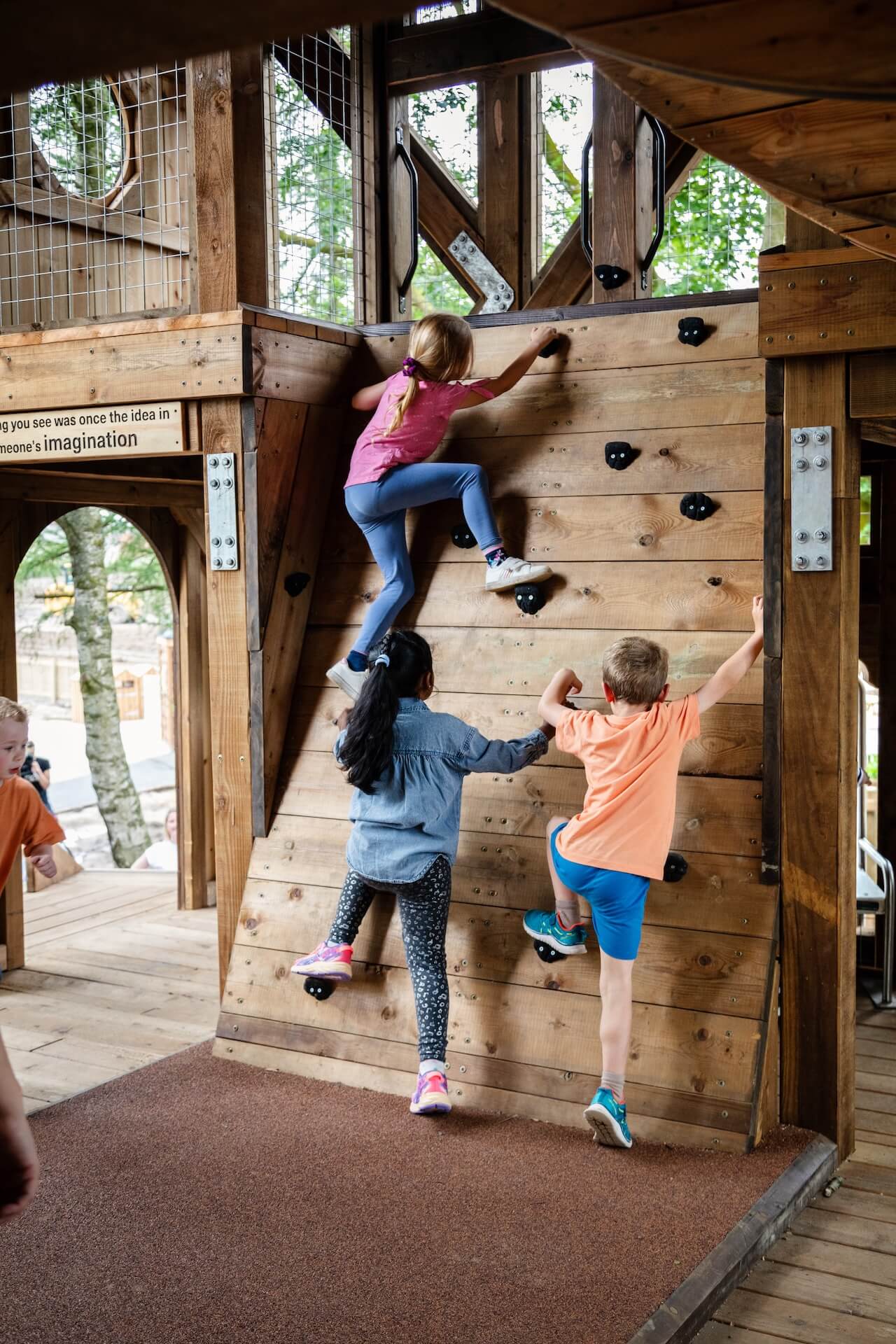 Climbing together at Hopetown Darlington adventure play by CAP.CO with photography by Kev Foster.