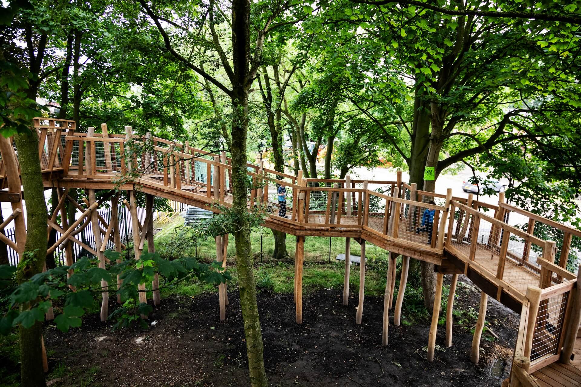 The long high level walkway into the trees at Hopetown Darlington adventure play by CAP.CO with photography by Kev Foster.