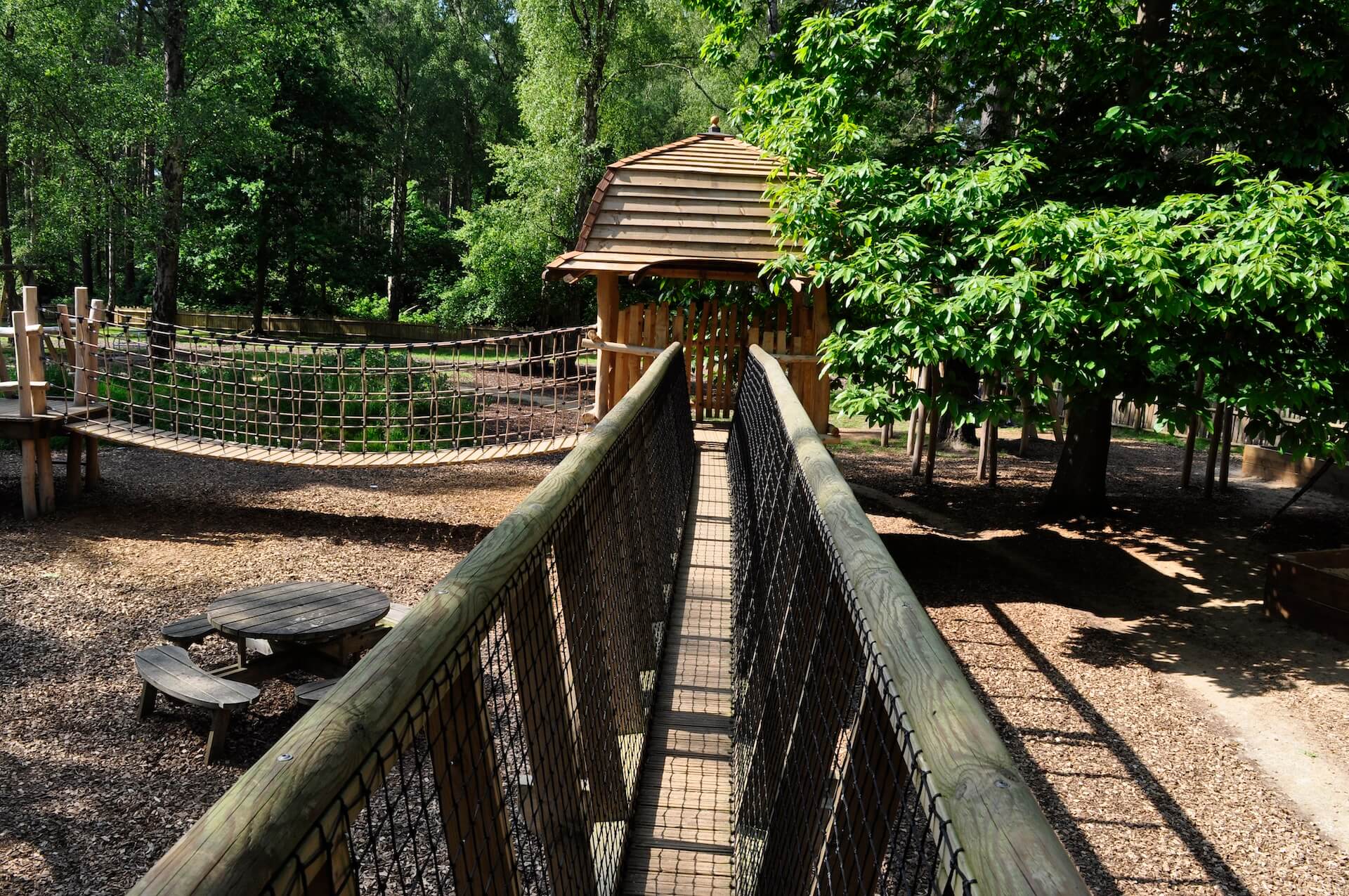 Clambering around the toddler adventure Play at Sandringham Estate