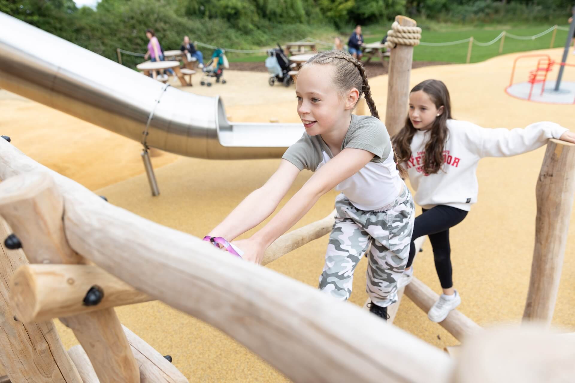 Climbing into the play at Explorers Basecamp at Bristol Zoo Project designed and built by CAP.CO