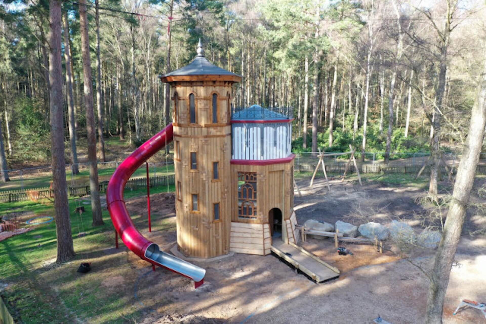 Distant shot of the water tower within the adventure play at Sandringham Estate by CAP.CO