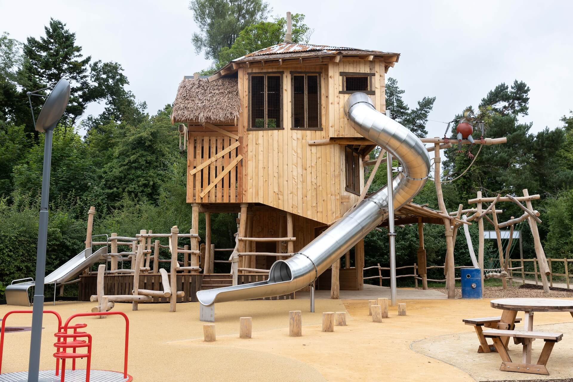 Side view with slide of the main play structure at Explorers Basecamp at Bristol Zoo Project designed and built by CAP.CO