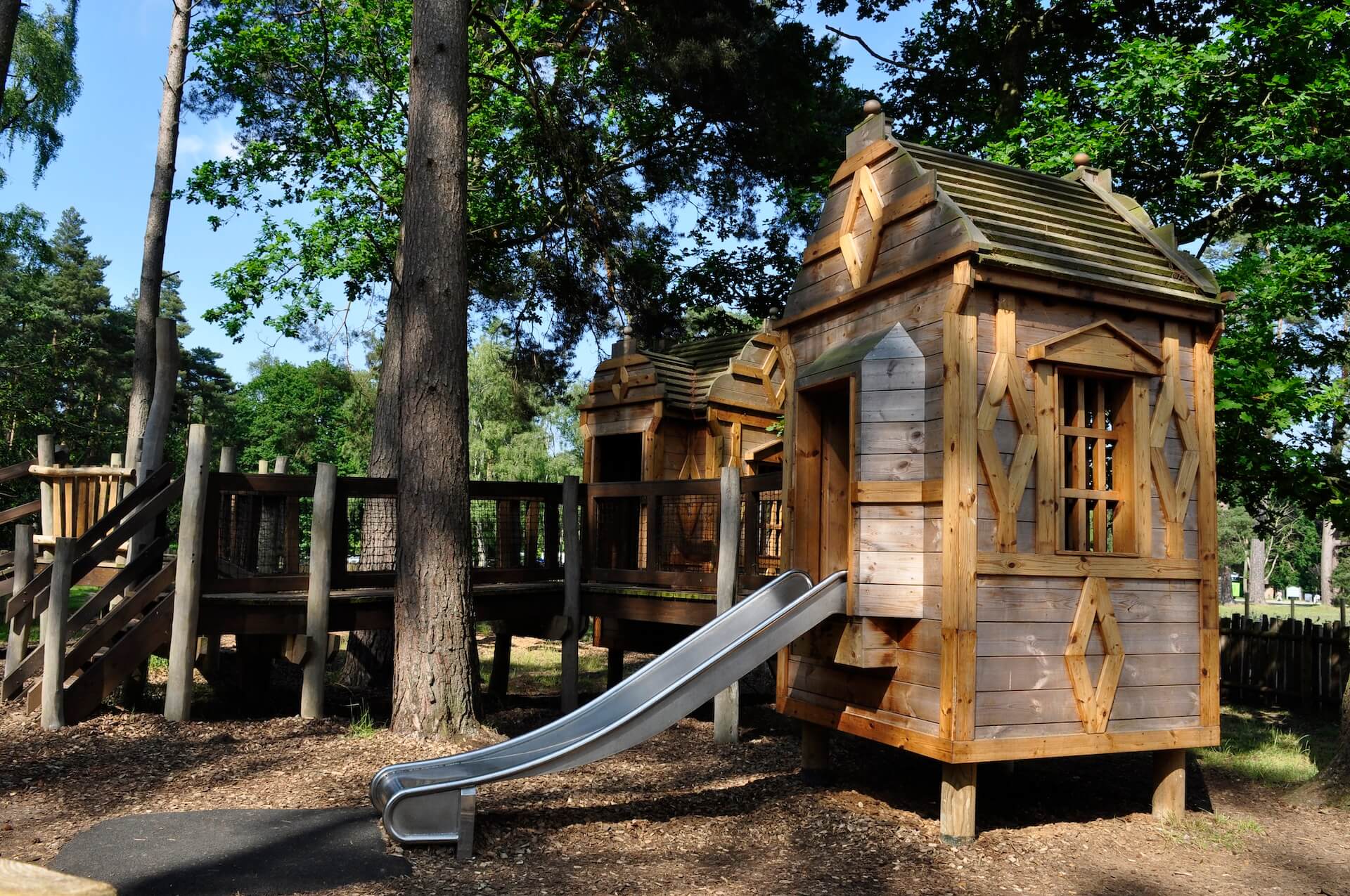 mini buildings for toddler play in the same design as the main Adventure Play at Sandringham Estate