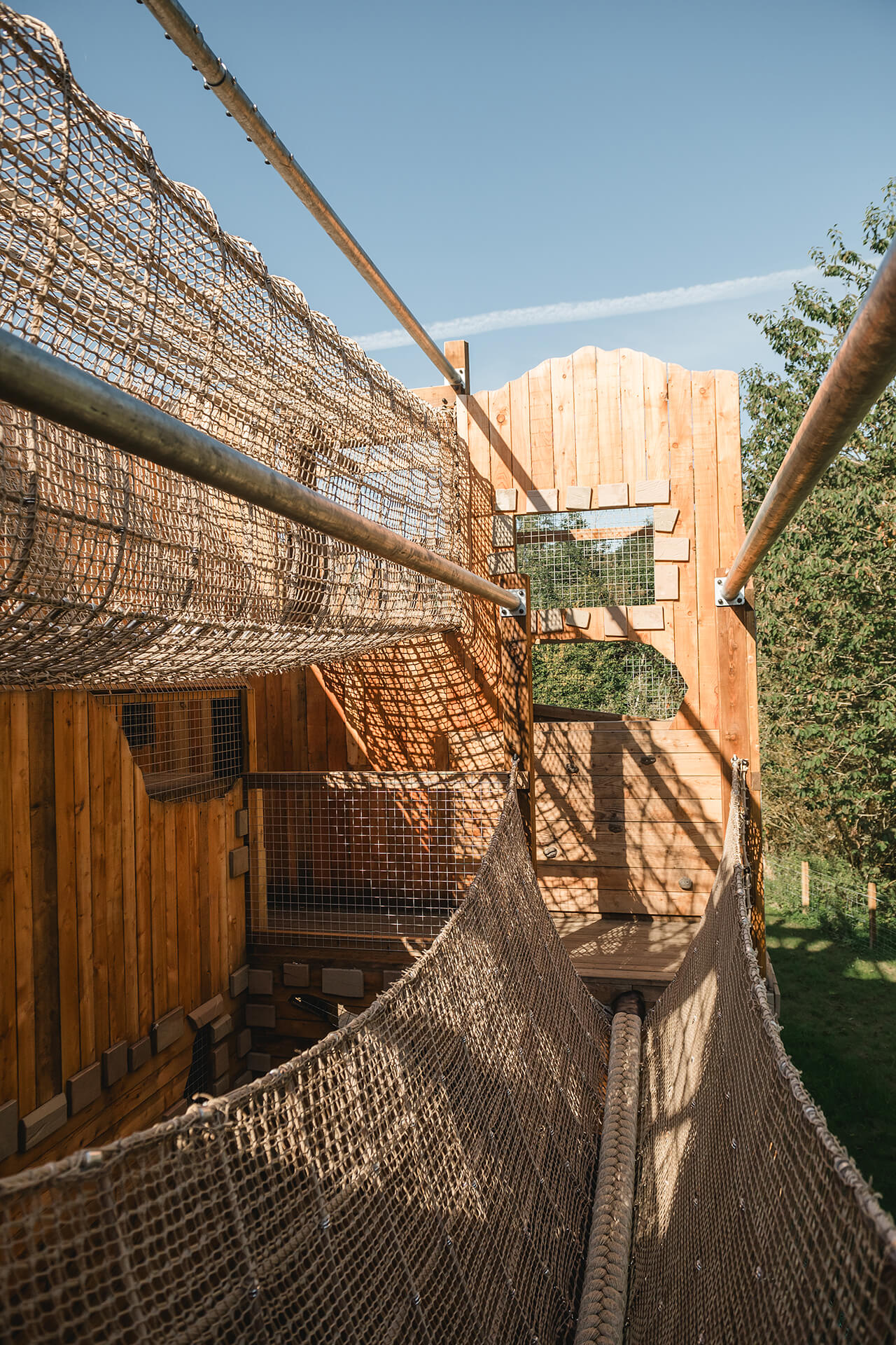 Two net bridges at the CAP.CO built adventure playground at Almond Valley photography by Lindsey Mack