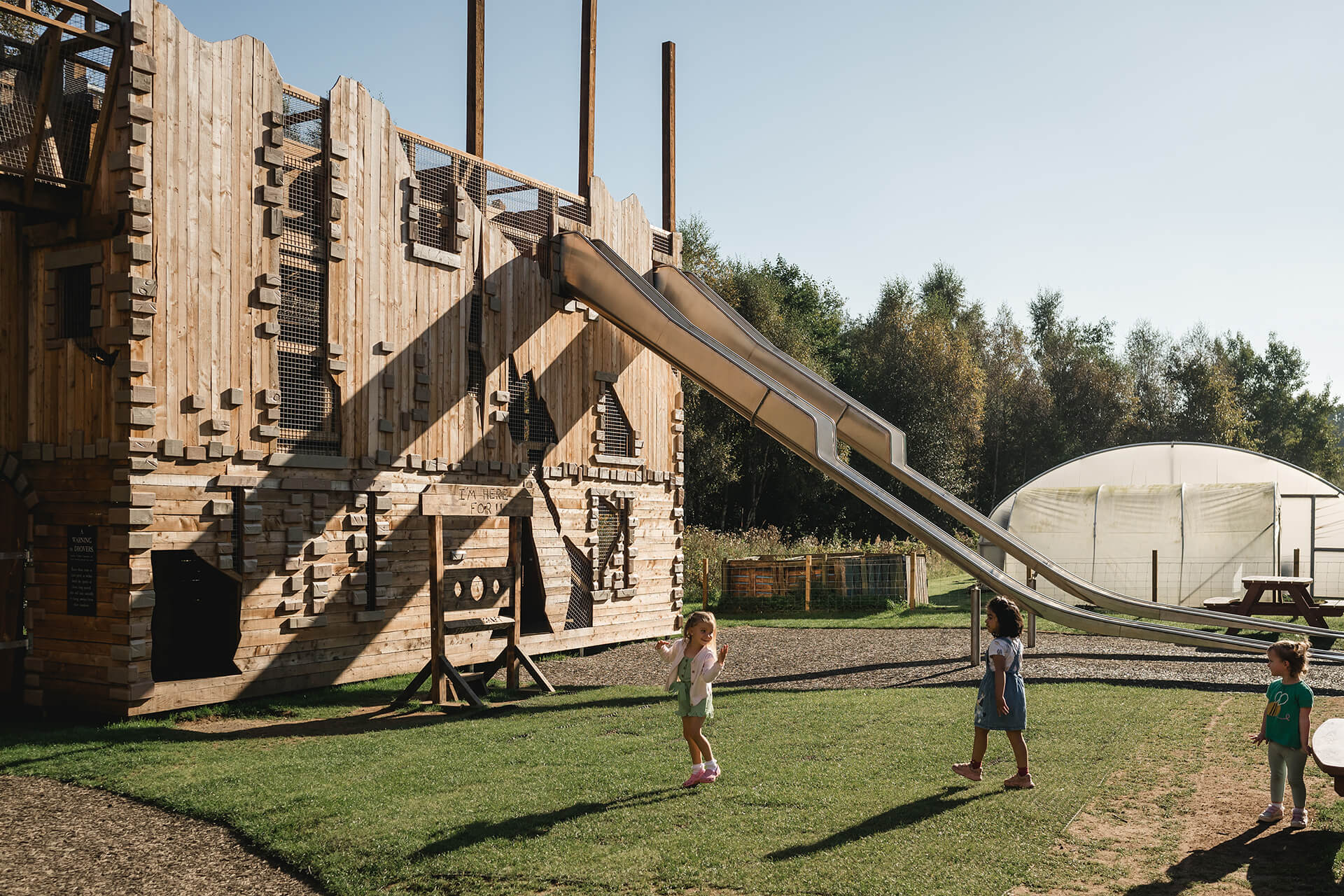 Two racing slides at theCAP.CO built adventure playground at Almond Valley photography by Lindsey Mack