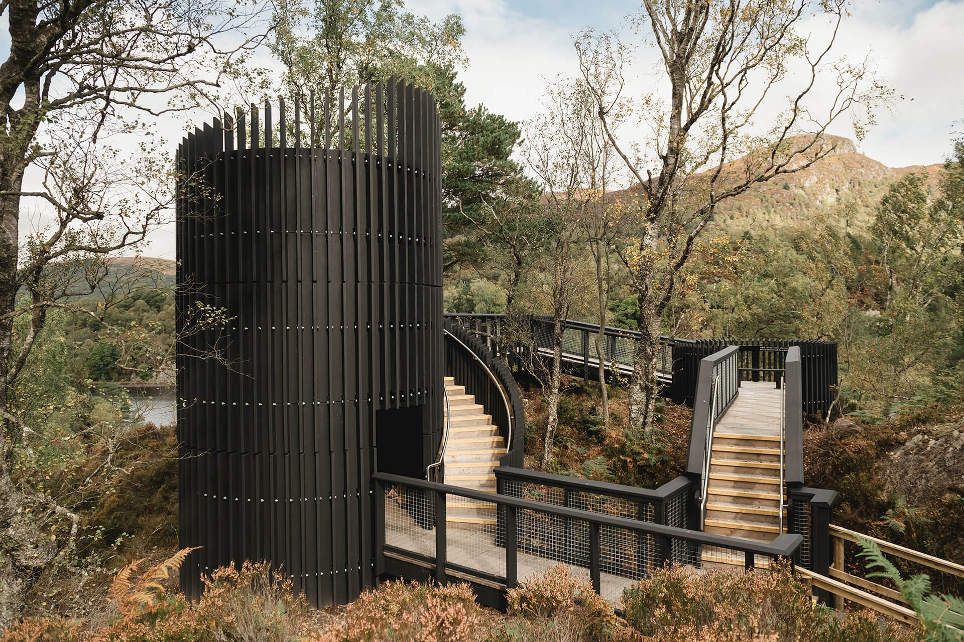 Wide landscape Image of the main tower built by CAPCO Roderick Dhu lookout tower at Loch Katrine photography by Lindsey Mack
