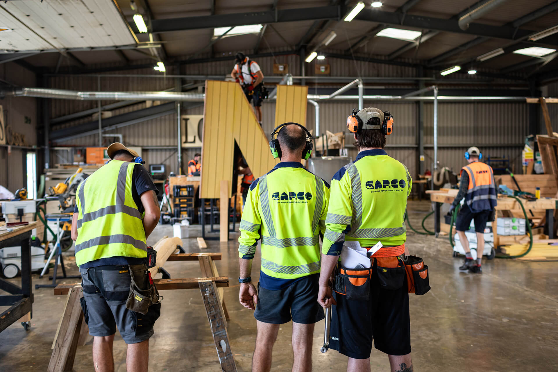 The CAPCO team admiring the prefabrication work photography by Kev Foster