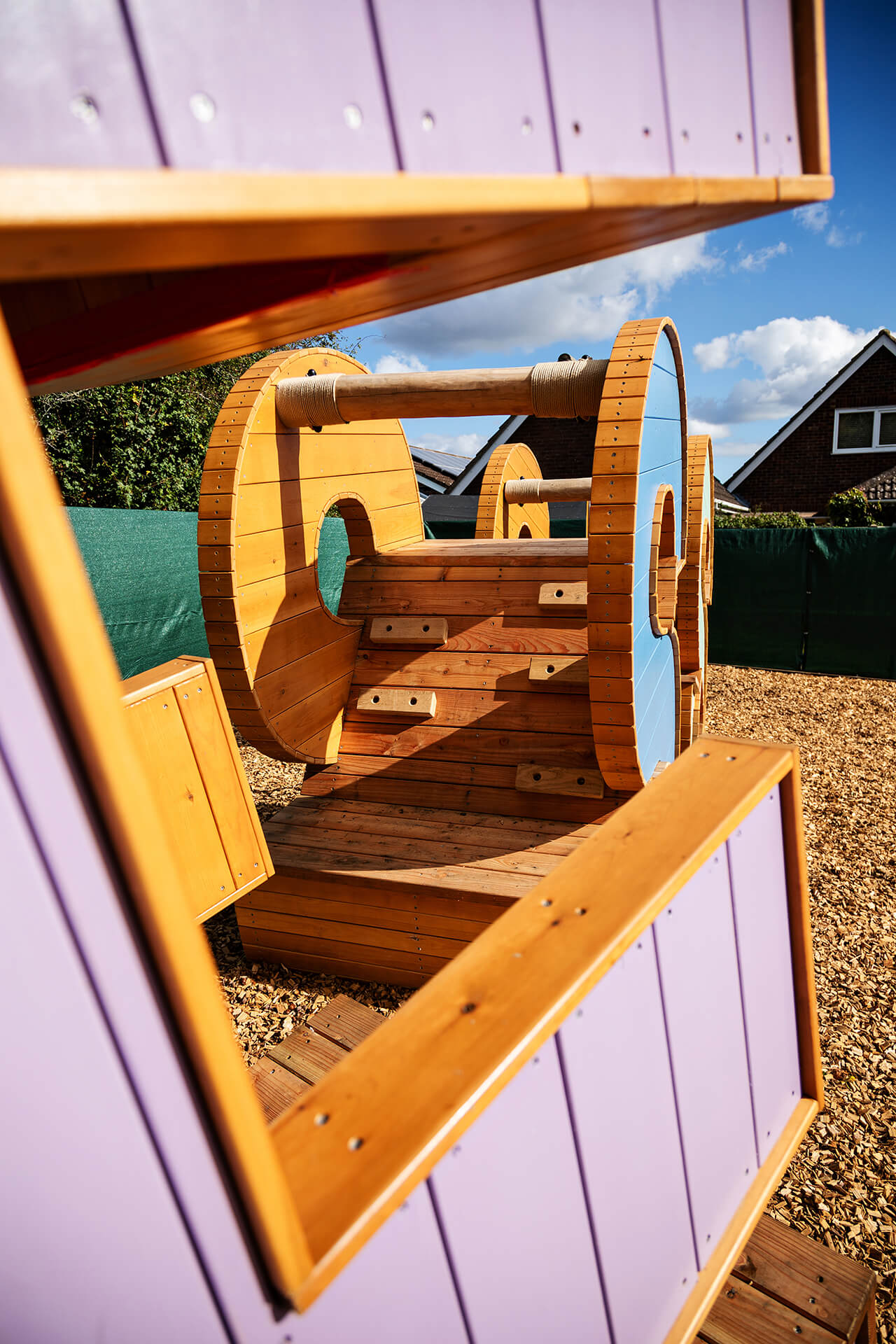 image showing off the play elements of the kindness playground at Poringland school playground built by CAP.CO photography by Kev Foster