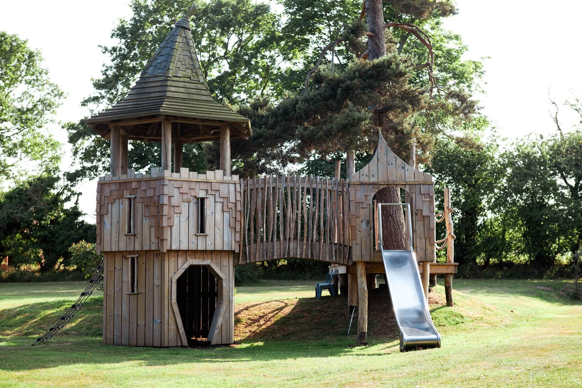 The Scarborough Hill Country Inn Hotel pine tower playground sits within the grounds built and designed by CAPCO photography by George Browne