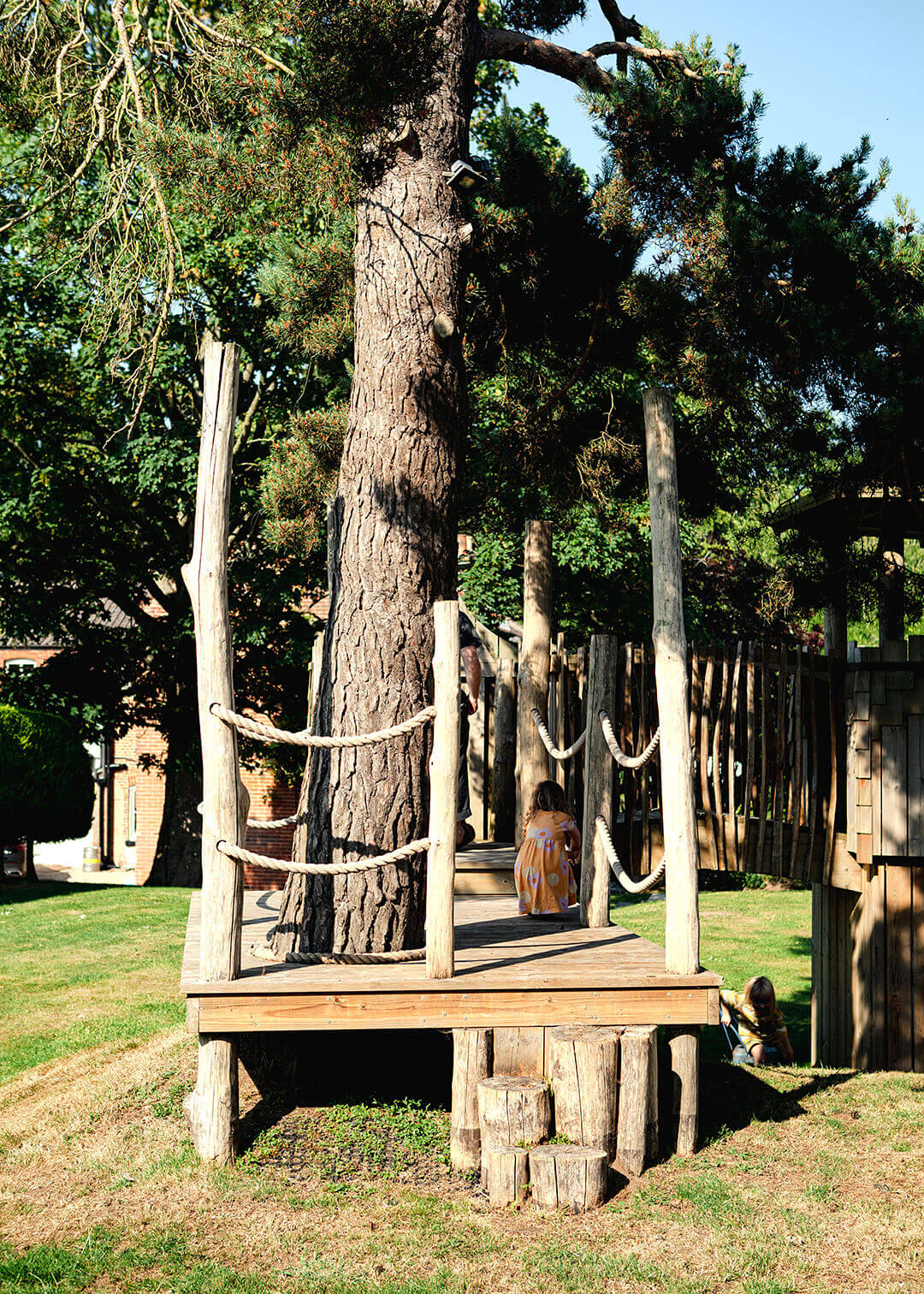 The platform with a stepping entrance at Scarborough Hill Country Inn Hotel pine tower playground built and designed by CAPCO photography by George Browne