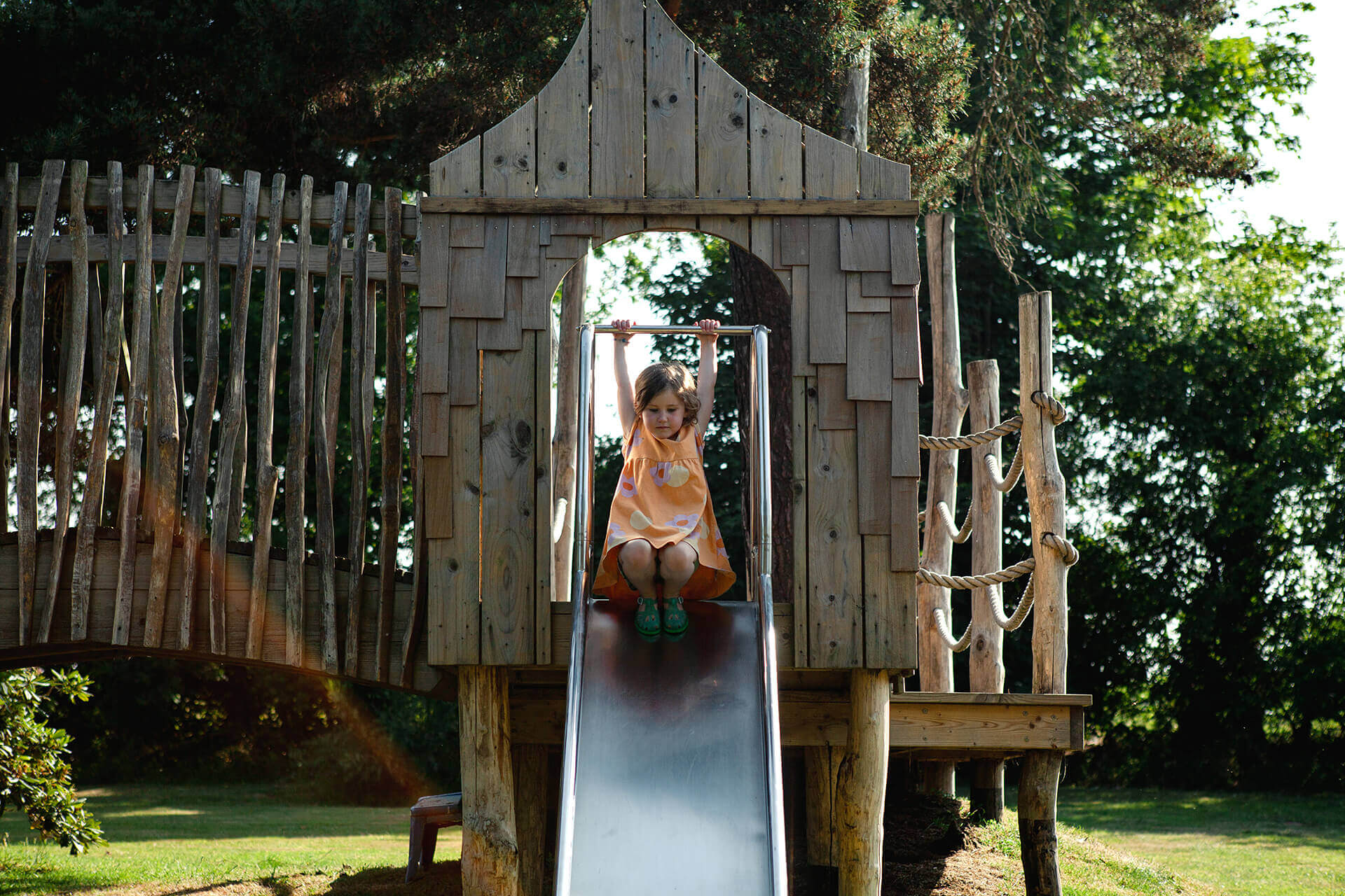 The slide coming off the platform at Scarborough Hill Country Inn Hotel pine tower playground built and designed by CAPCO photography by George Browne