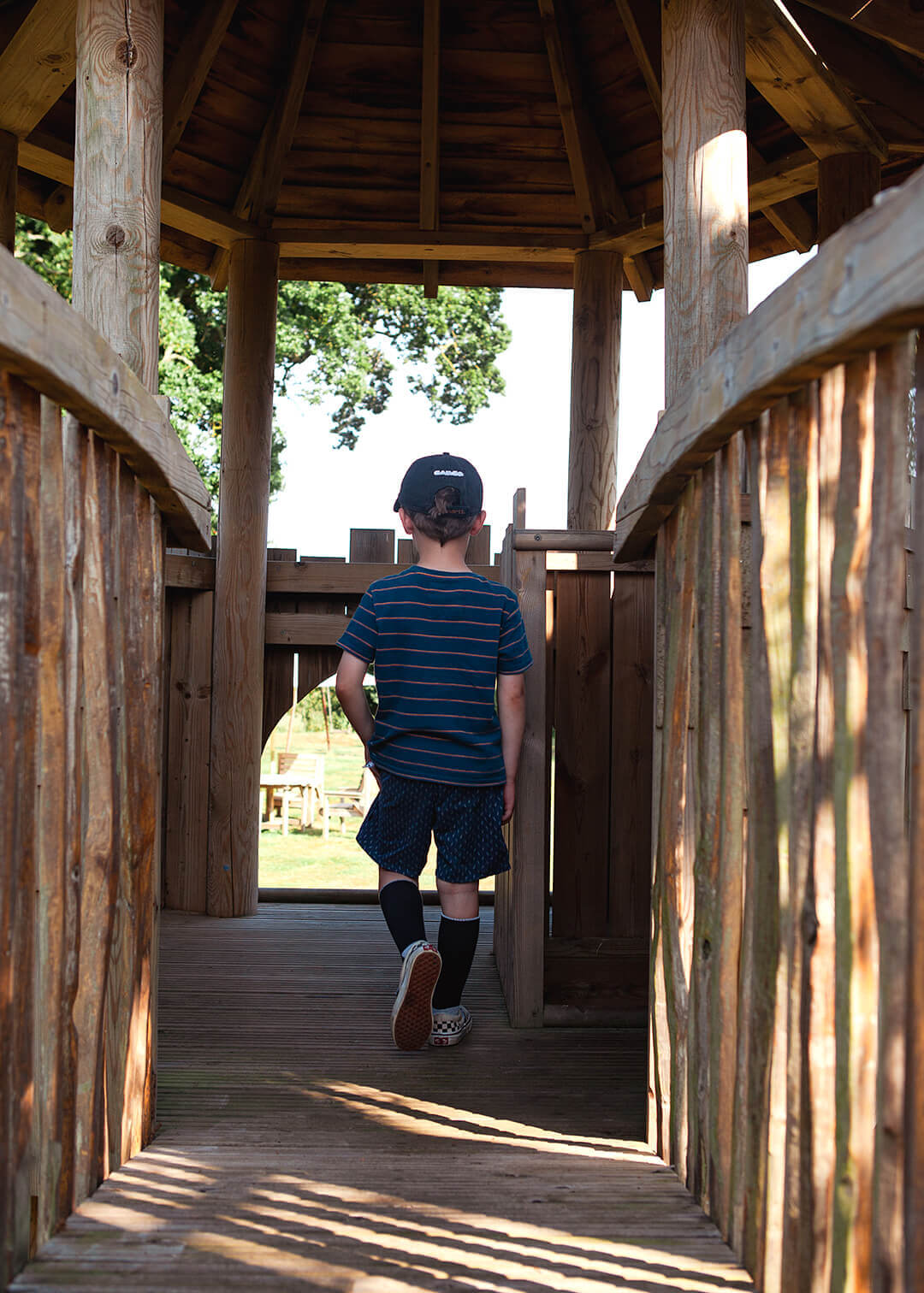 Walking through the climbing frame at Scarborough Hill Country Inn Hotel pine tower playground built and designed by CAPCO photography by George Browne