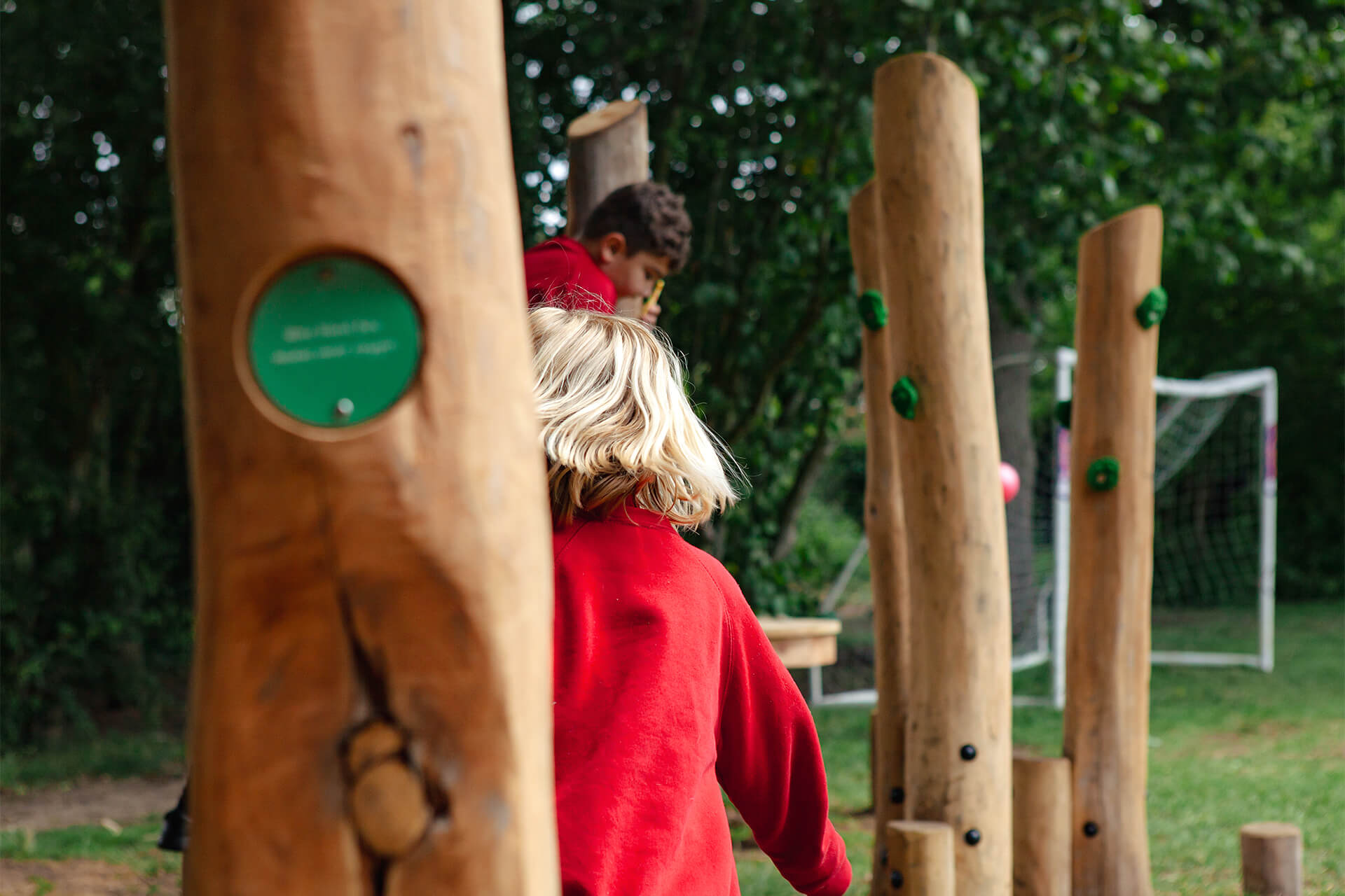 Bespoke school playground installation by CAP.CO at Fen Drayton Primary School with children playing