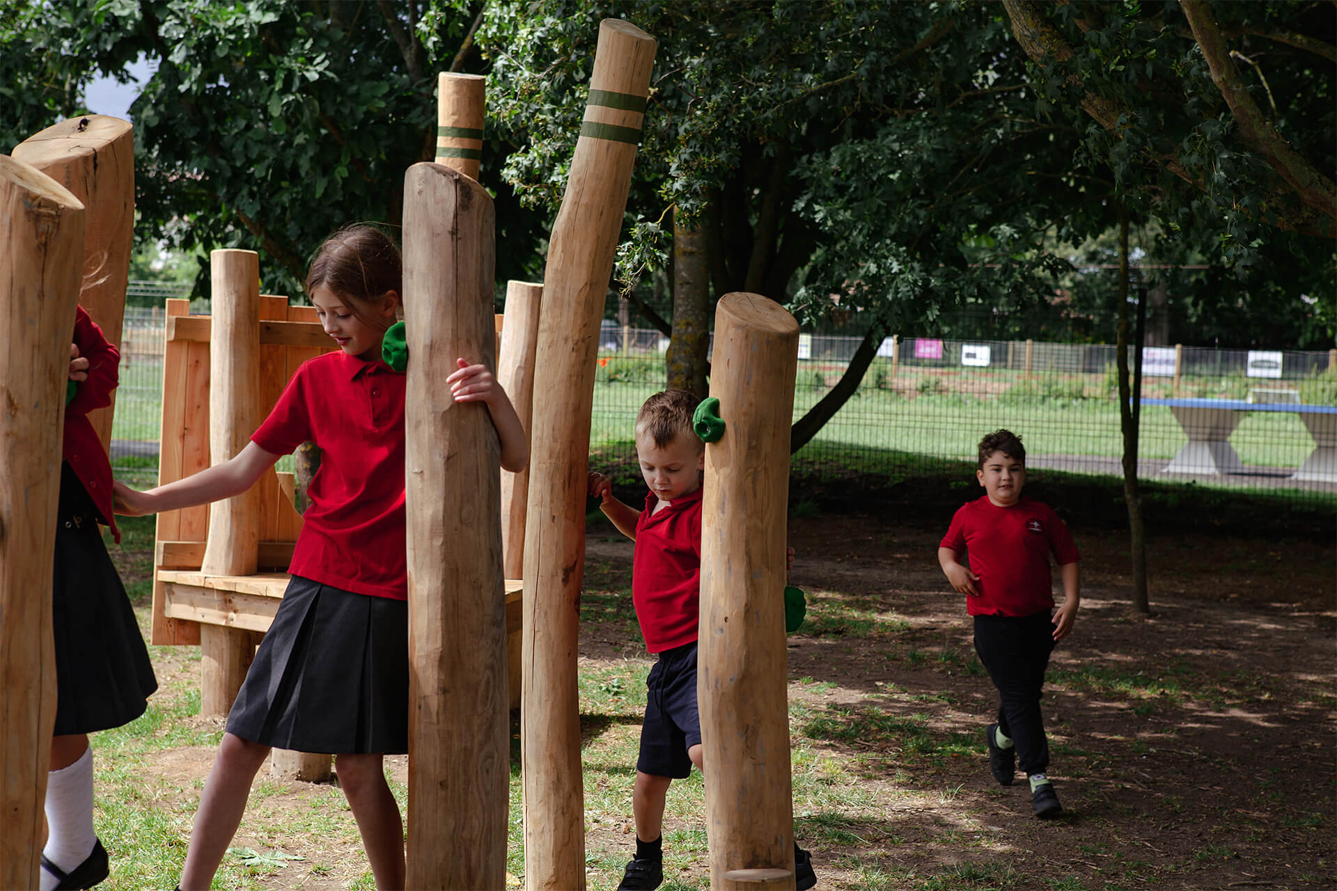 CAP.CO playground design for UK schools with children having fun at Fen Drayton Primary School
