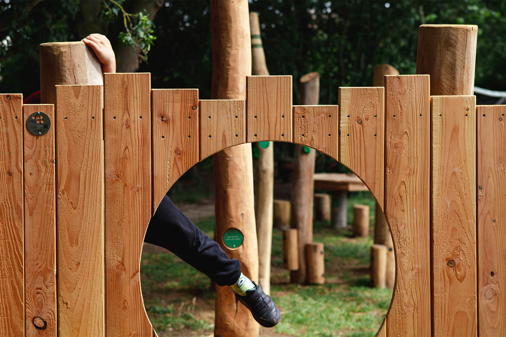 Children playing together on a bespoke UK school playground by CAP.CO