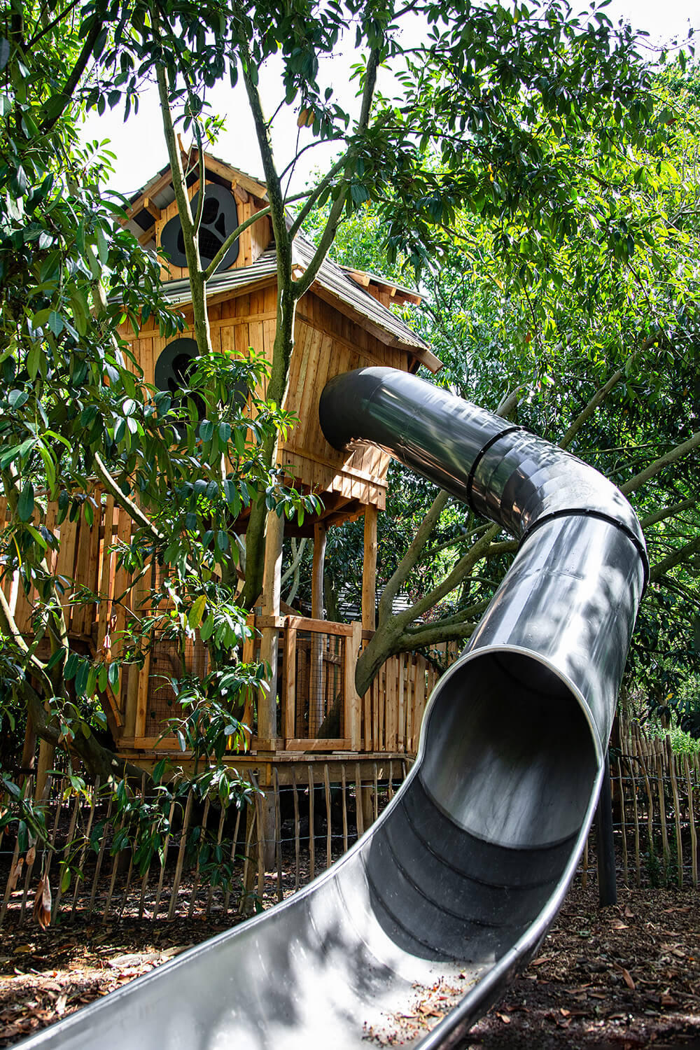 Covered twisting slide in Flint’s Hollow designed for imaginative descent by CAP.CO, photography by Kev Foster