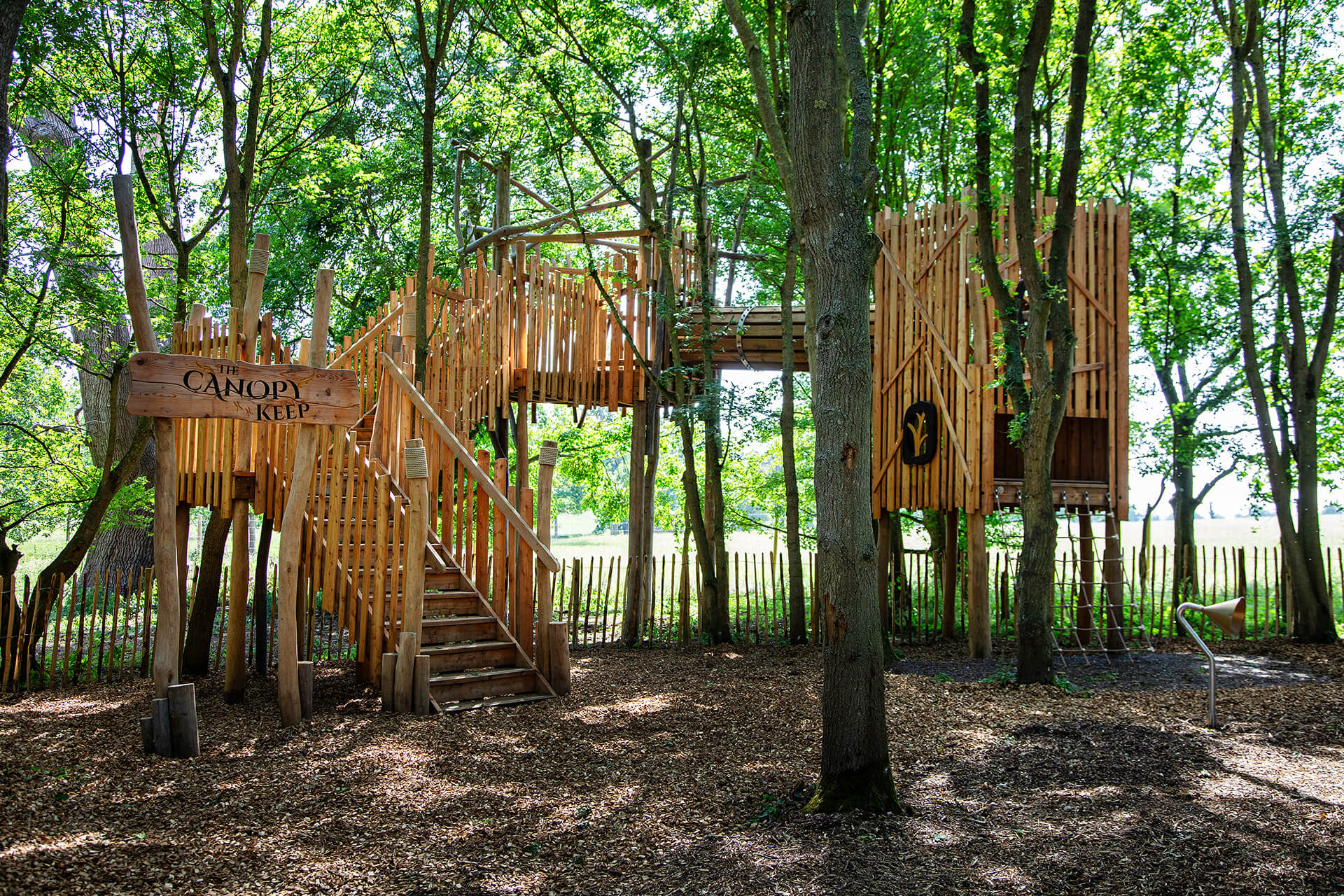 High-level play platform among treetops at Guildenacre by CAP.CO, photography by Kev Foster