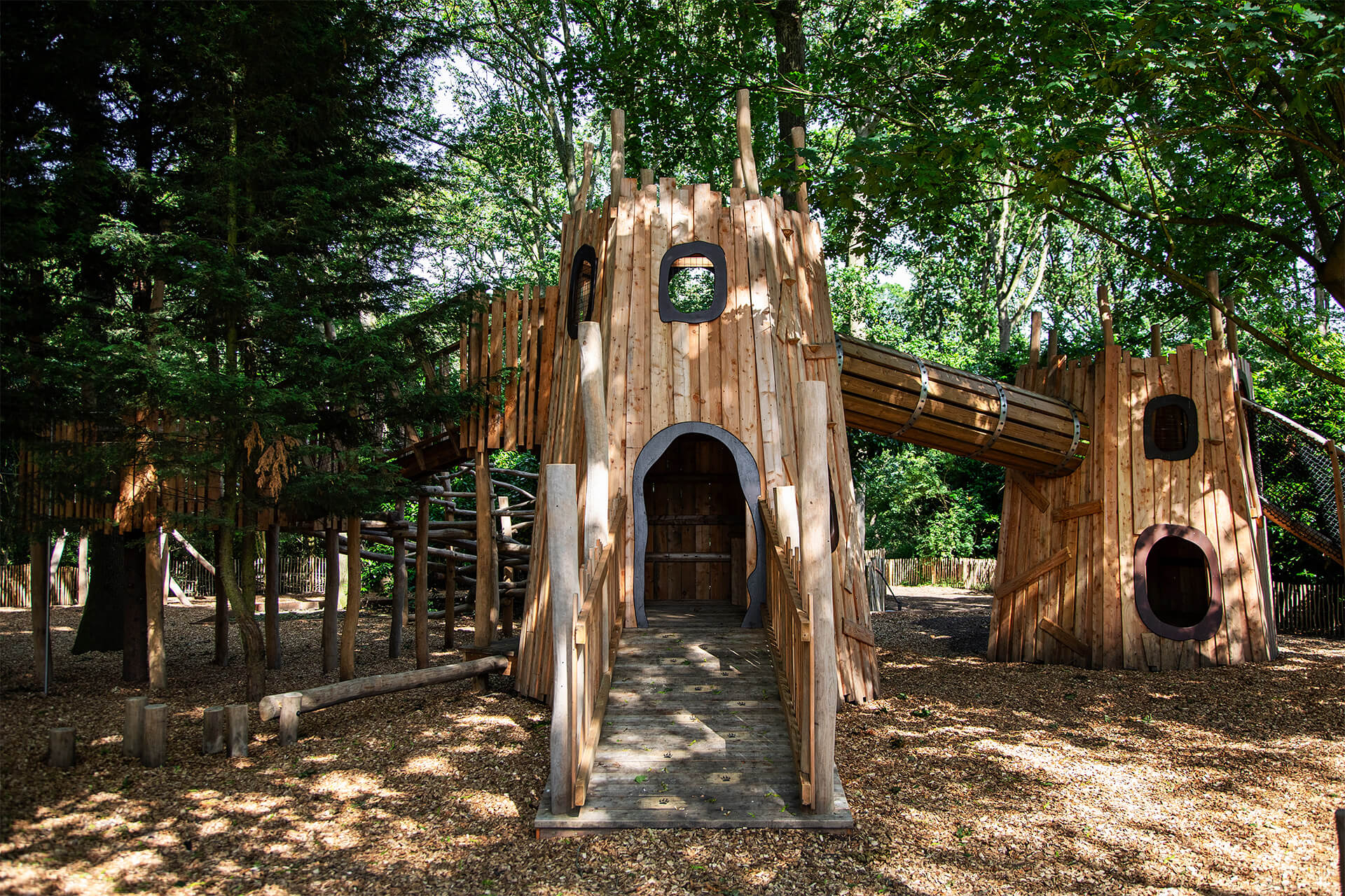Naturalistic play design blending with ancient woodland at Helmingham Hall by CAP.CO, photography by Kev Foster