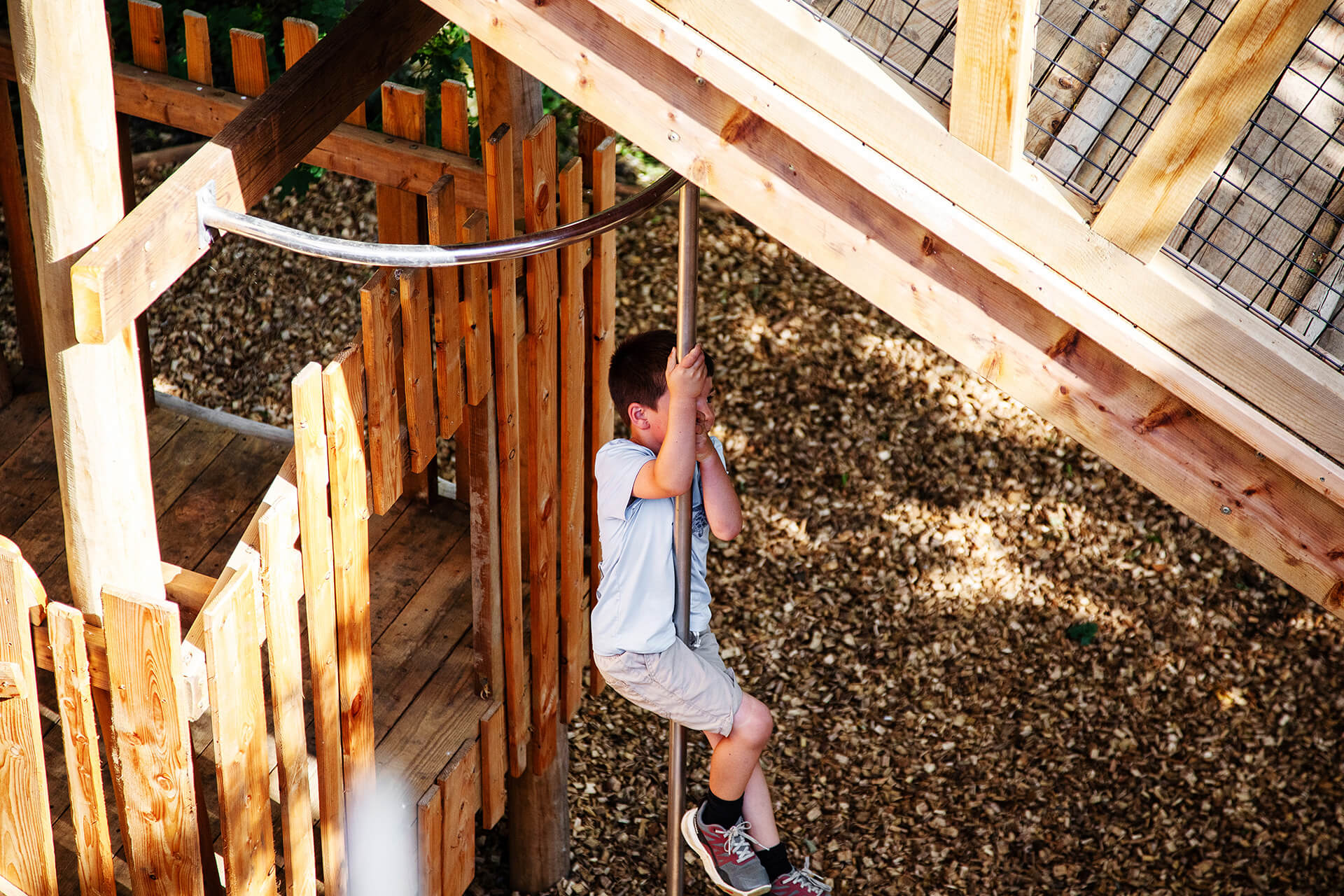 The firemans pole at Guildenacre adventure playground at Helmingham designed and built by CAP.CO, photography by Kev Foster