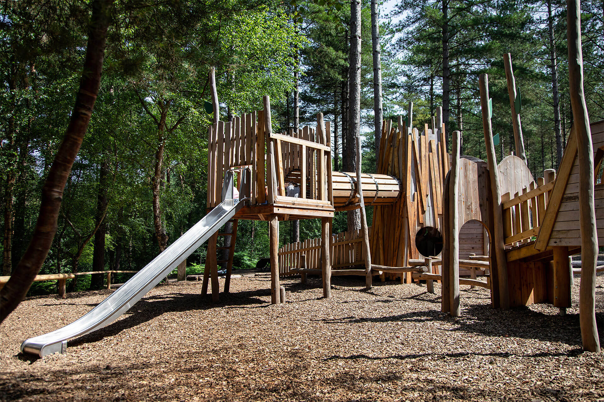 Wide view of CAP.CO’s Ants’ Nest playground set within the woodland at Moors Valley